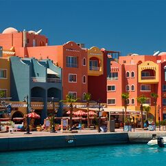 panoramic seascape on colorful Marina promenade street from Red Sea with moored motor yachts. Marina, Hurghada, Egypt Von Olesi